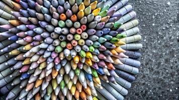 Array of pastel crayons arranged in a circular pattern. photo