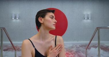 Charming Young Adult Woman Enjoying Jacuzzi In Pool In Modern SPA Center, Lazy Day In SPA video