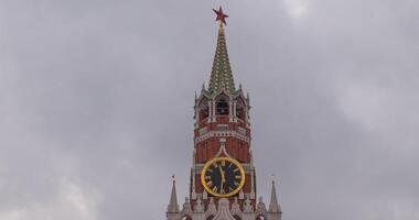 The Moscow Kremlin Main Clock named Kuranti on Spasskaya Tower 12 hours . Red Square. Timelapse. video