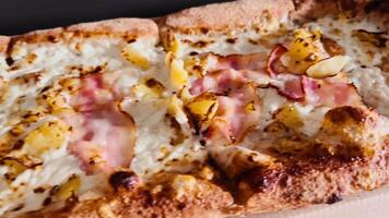 Pizza closeup with golden potato slices, creamy cheese, and crispy crust. Potato creates rustic feel, potato adds rich flavor, potato topping ideal for comfort food visuals. Pizza with baked potato video