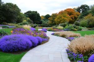 Winding stone path through colorful autumn garden in Montreal Botanical Garden photo