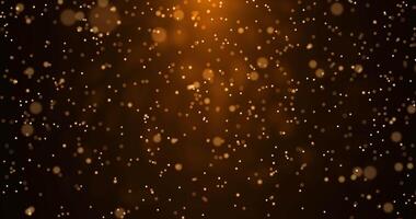 Rising chaotically moving dust in the light of a yellow lantern. Bokeh particles. 445 video