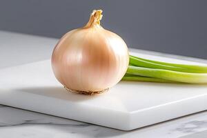 Fresh onion and spring onions resting on white cutting board photo