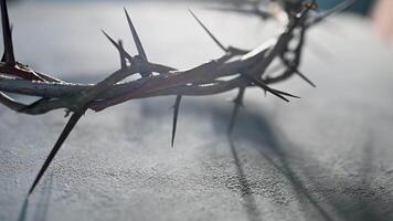 Jesus Crown of thorns a distinct shadow on a for Christian background, Easter concept, creating a symbolic image of suffering, sacrifice, and remembrance video