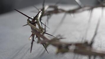 Jesus Crown of thorns distinct shadow on a for Christian background, Easter concept, creating a symbolic image of suffering, sacrifice, and remembrance video