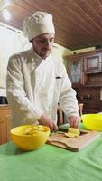 Home chef cuts Potatoes To Make Them Fried On Table video