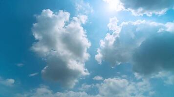 Clouds in the sky with the sun shining through video