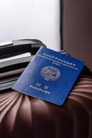 International passport of North Korea on a suitcase photo