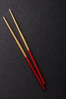 Chopstick Japanese or Chinese for eating sushi, rolls photo