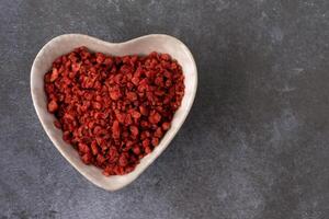 Bacon Bits in a Heart Shaped Bowl photo