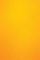 Solid yellow-orange gradient background with a smooth and vibrant texture. vector