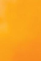 A vibrant, solid orange background with a slight gradient and soft texture. vector