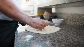 Chef Putting Mozzarella On Top Of The Raw Pizza Dough video