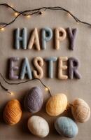 Colorful Pastel Easter Scene with Wool Text Decoration photo
