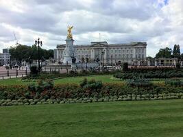 A view of Buckingham Palace in London in August 2023 on a cloudy day photo
