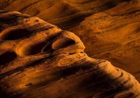 A close up of the rock formations in the desert photo