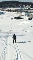 A novice skier learning to ski on a freeride track. Skiing training on the territory of the recreation complex. video