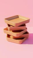 Wooden tray stack containers for carrying food and drinks in pink vertical background photo