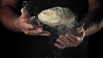The dough is in the hands of the chef. Filmed on a high-speed camera at 1000 fps. High quality FullHD footage video