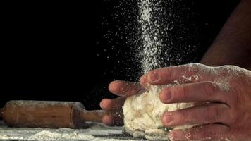 The dough is in the hands of the chef. Filmed on a high-speed camera at 1000 fps. High quality FullHD footage video