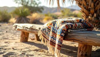 Colorful Woven Blanket on Rustic Wooden Bench in Desert photo