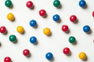 Colorful candy balls on white background photo