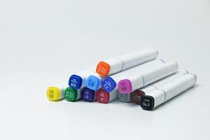 Set of Assorted Markers on Minimalist Background photo