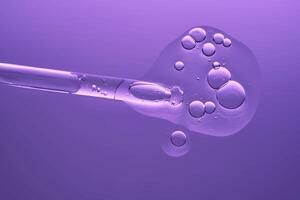 Serum with peptides on a lilac background with a pipette. The texture. photo