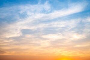 Beautiful , luxury soft gradient orange gold clouds and sunlight on the blue sky perfect for the background, take in evening,Twilight, Large size, high definition photo