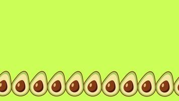 A row of small avocados neatly aligned at the bottom edge of a vibrant green backdrop, offering a clean and balanced composition video