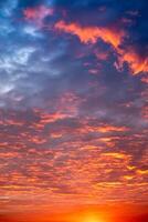 Beautiful , luxury soft gradient orange gold clouds and sunlight on the blue sky perfect for the background, take in evening,Twilight, Large size, high definitio photo