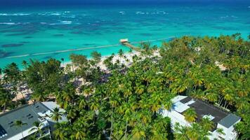 Flight over the all-inclusive beach resort territory in tropical Punta Cana video
