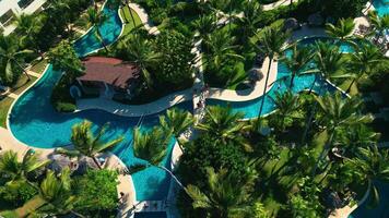 Aerial view of a tourist swimming pool located at Dreams Royal Bavaro Punta Cana video
