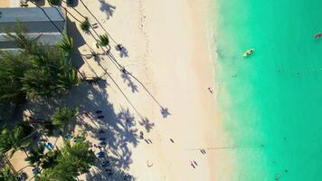 Top-down view of tourists arriving at a tourist beach in Punta Cana by kayak video