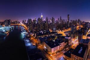 the city skyline at night in new york photo