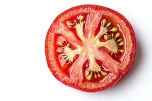 a tomato cut in half on a white background photo