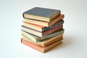 a stack of old books on a white background photo
