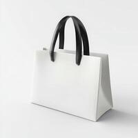 White shopping bag with black handles on white background photo
