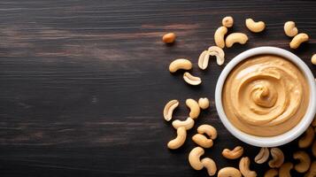 Cashew butter spread on a wooden table photo