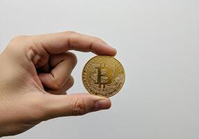 Bitcoin in Front of Rising Stock Market Chart photo