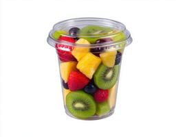 A cup filled with fruit and vegetables photo