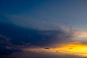 Hazy and partly cloudy sky background photo. photo