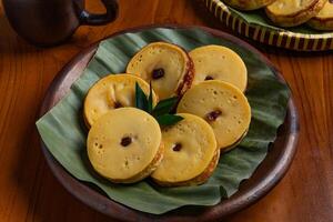 Kue lumpur brings the rich flavor of Indonesian tradition and heritage background photo