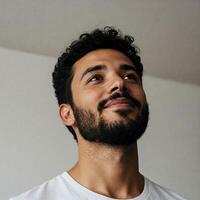Man Looking Upwards with Hope and Optimism photo