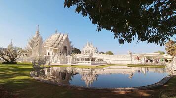 Chiang Rai, Thailan ,2024 - sunny Wat Rong Khun or White Temple - famous Buddhist temple in Pa O Don Chai, Mueang District, Chiang Rai Province, Thailand. Famous sightseeing landmark video