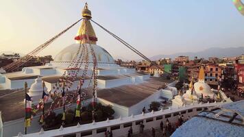 Bouddha or Boudhanath on sunset and visitors sightseeing city. Khasti Chaitya and Khasa Chaitya stupa in Kathmandu, Nepa video
