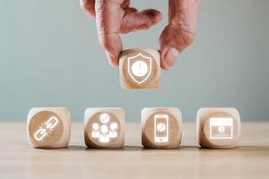 Visual representation of strong customer authentication using security icons on wooden blocks, emphasizing digital safety. photo