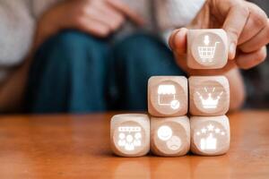 Wooden blocks with icons representing the net promoter score concept, highlighting customer satisfaction and feedback. photo