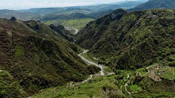 River Flowing In The Middle Of The Mountains, Aerial View video