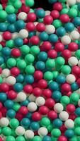 Colorful Little Balls Transition On Vertical Alpha Loop video